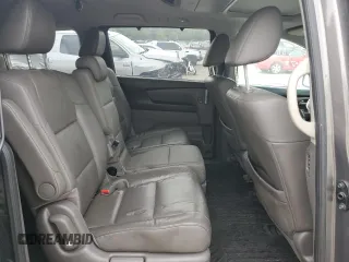 2012 Honda Odyssey Touring with VIN 5FNRL5H94CB109257, listed as a Copart auction lot 59636075 with 107,543 mi miles and Salvage title. Bid and sale history available at DreamBid. Image 11.