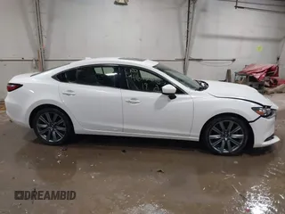 2019 Mazda 6 Grand Touring with VIN JM1GL1TYXK1505439, listed as a IAAI auction lot 41672678 with 52,990 mi miles and . Bid and sale history available at carsss.com. Image 13.