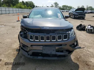 2018 Jeep Compass Altitude с VIN 3C4NJDBB5JT114847, выставлен на аукционе Copart как лот 59864675 с пробегом 123 036 миль миль и Списание • Salvage title. История ставок и продаж доступна на DreamBid. Изображение 5.