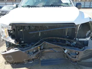 2019 Ford F-150 XL with VIN 1FTEW1EP8KKD98520, listed as a IAAI auction lot 41775566 with 128,021 mi miles. Bid and sale history available at carsss.com. Image 10.