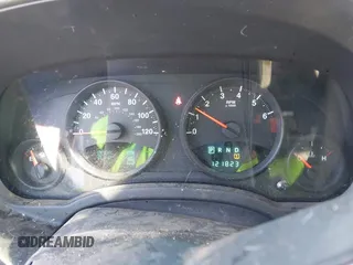 2013 Jeep Patriot Latitude with VIN 1C4NJPFB0DD192541, listed as a IAAI auction lot 41632796 with 121,823 mi miles. Bid and sale history available at carsss.com. Image 7.