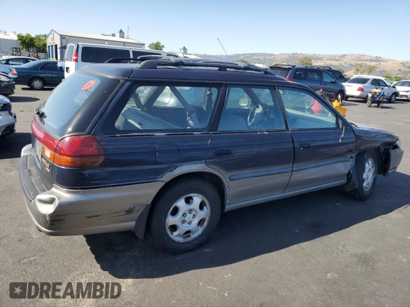 1996 Subaru Legacy with VIN 4S3BG4859T6986223, listed as a Copart auction lot 57683345 with 265,568 mi miles and Salvage title. Bid and sale history available at DreamBid. Image 3.