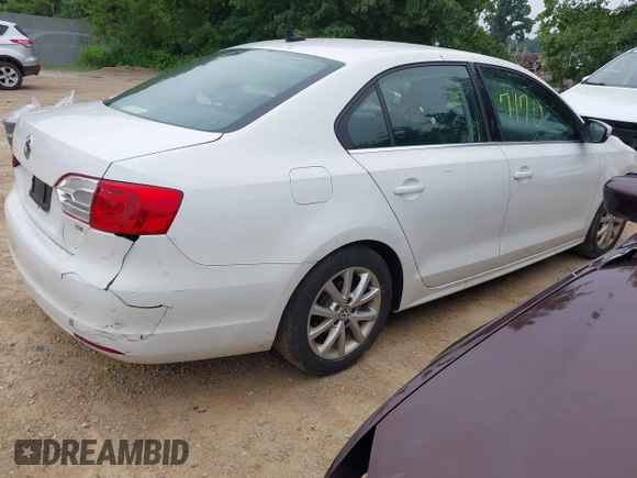 2014 Volkswagen Jetta SE with VIN 3VWD17AJ0EM371501, listed as a IAAI auction lot 42597170 with 166,686 mi miles and . Bid and sale history available at DreamBid. Image 4.