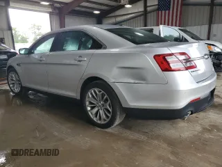 2014 Ford Taurus Limited z VIN 1FAHP2F82EG115503, wystawiony jako Copart lot #64836755 z przebiegiem 111 691 mil mil oraz Szkoda całkowita • Salvage title. Historia ofert i sprzedaży dostępna na DreamBid. Obrazek 2.