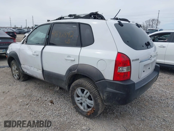 2006 Hyundai Tucson GLS with VIN KM8JN72D26U322893, listed as a IAAI auction lot 41882842 with 116,972 mi miles. Bid and sale history available at carsss.com. Image 3.