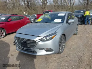 2018 Mazda Mazda3 4-Door Touring with VIN 3MZBN1V37JM262418, listed as a IAAI auction lot 41880212 with 118,662 mi miles. Bid and sale history available at carsss.com. Image 17.
