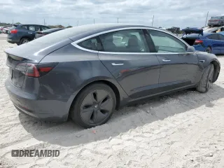 2019 Tesla Model 3 Mid Range z VIN 5YJ3E1EA4KF434741, wystawiony jako Copart lot #53857935 z przebiegiem Nie podano mil oraz Szkody całkowita. Historia ofert i sprzedaży dostępna na DreamBid. Obrazek 3.