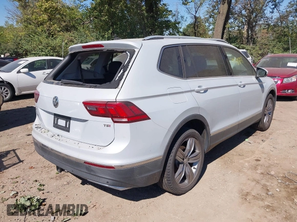 2018 Volkswagen Tiguan SEL Premium with VIN 3VV5B7AX5JM004713, listed as a IAAI auction lot 40498843 with 92,256 mi miles and . Bid and sale history available at DreamBid. Image 4.