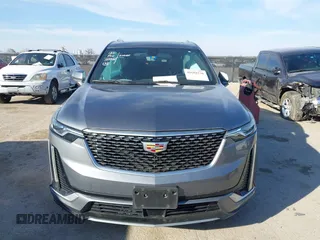 2020 Cadillac XT6 FWD Premium Luxury z VIN 1GYKPCRS8LZ129799, wystawiony jako IAAI lot #41602536 z przebiegiem 96 865 mil mil oraz . Historia ofert i sprzedaży dostępna na DreamBid. Obrazek 12.