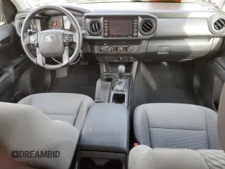 2023 Toyota Tacoma SR with VIN 3TYSX5EN2PT017593, listed as a Copart auction lot 84904364 with 20,226 mi miles and Salvage title. Bid and sale history available at DreamBid. Image 8.