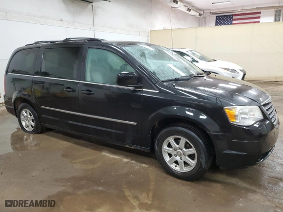 2010 Chrysler Town & Country Touring Plus with VIN 2A4RR8D17AR415512, listed as a Copart auction lot 49736145 with 141,127 mi miles and Clean Title. Bid and sale history available at carsss.com. Image 4.