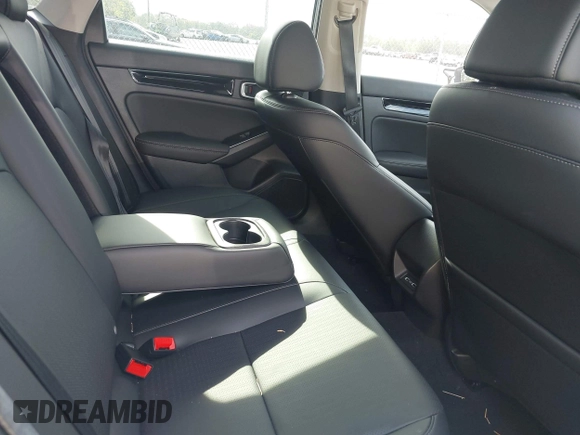 2023 Honda Civic Touring with VIN 2HGFE1F91PH305053, listed as a IAAI auction lot 42378311 with 41,576 mi miles and . Bid and sale history available at DreamBid. Image 8.