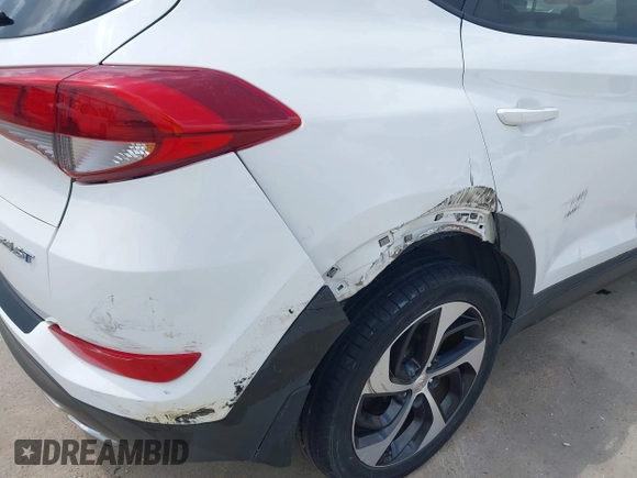 2016 Hyundai Tucson Limited with VIN KM8J33A21GU079870, listed as a IAAI auction lot 42074089 with 78,328 mi miles. Bid and sale history available at carsss.com. Image 6.