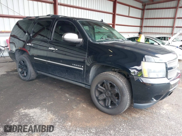 2009 Chevrolet Tahoe LTZ z VIN 1GNFK330X9R219064, wystawiony jako IAAI lot #42261154 z przebiegiem 125 511 mil mil oraz . Historia ofert i sprzedaży dostępna na DreamBid. Obrazek 1.