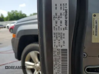2011 Jeep Patriot Sport with VIN 1J4NT1GB6BD287389, listed as a Copart auction lot 56495085 with 188,650 mi miles and Salvage title. Bid and sale history available at DreamBid. Image 13.
