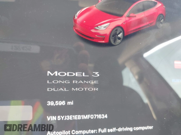 2021 Tesla Model 3 Long Range with VIN 5YJ3E1EB1MF071634, listed as a IAAI auction lot 41964321 with 39,596 mi miles. Bid and sale history available at carsss.com. Image 15.