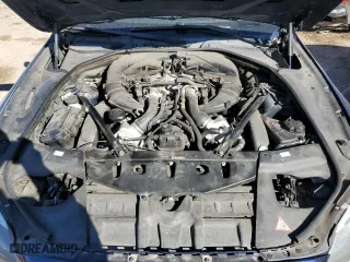 2012 BMW 6 Series 650i with VIN WBALX3C52CDV77706, listed as a Copart auction lot 77685994 with 81,514 mi miles and Salvage Title. Bid and sale history available at carsss.com. Image 11.
