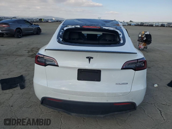 2022 Tesla Model Y Performance with VIN 7SAYGDEF1NF342071, listed as a Copart auction lot 43084905 with 30,534 mi miles and Salvage Title. Bid and sale history available at DreamBid. Image 6.