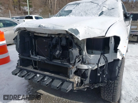 2019 Toyota Tacoma SR z VIN 5TFCZ5AN9KX178090, wystawiony jako IAAI lot #41155337 z przebiegiem 115 265 mil mil oraz . Historia ofert i sprzedaży dostępna na DreamBid. Obrazek 6.