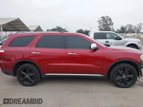 2013 Dodge Durango Citadel with VIN 1C4RDJEGXDC669937, listed as a IAAI auction lot 42105204 with 153,015 mi miles and . Bid and sale history available at DreamBid. Image 13.