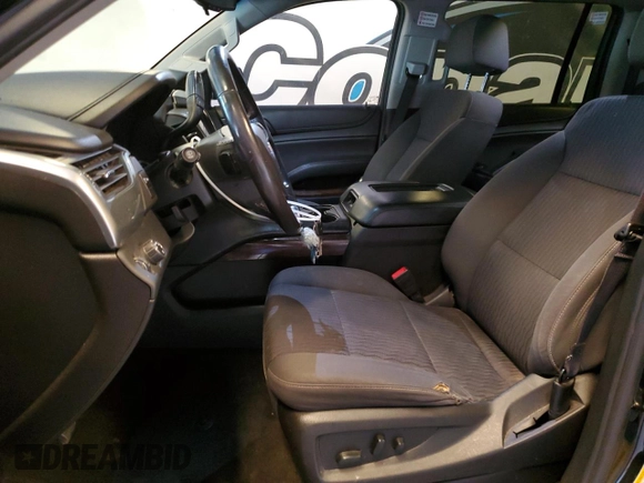 2018 Chevrolet Suburban LS z VIN 1GNSCGKC0JR278370, wystawiony jako Copart lot #57657395 z przebiegiem 224 903 mil mil oraz Czysty tytuł • Clean title. Historia ofert i sprzedaży dostępna na DreamBid. Obrazek 7.