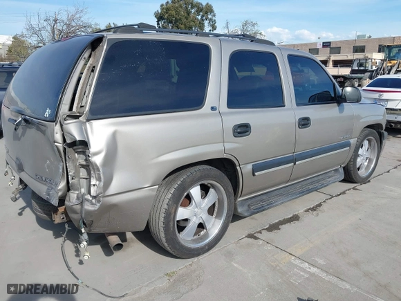 2001 Chevrolet Tahoe LS with VIN 1GNEK13T51J203013, listed as a IAAI auction lot 41886371 with 218,779 mi miles. Bid and sale history available at carsss.com. Image 4.
