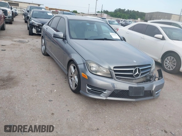 2014 Mercedes-Benz C 250 Sport with VIN WDDGF4HB7EG257087, listed as a IAAI auction lot 42169917 with 165,278 mi miles and . Bid and sale history available at DreamBid. Image 1.