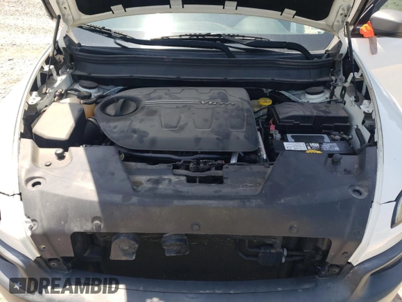 2016 Jeep Cherokee Trailhawk with VIN 1C4PJMBS3GW102000, listed as a Copart auction lot 60866505 with 120,985 mi miles and Salvage title. Bid and sale history available at DreamBid. Image 12.