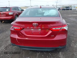 2019 Toyota Camry LE with VIN 4T1B11HK8KU823736, listed as a IAAI auction lot 42166696 with 21,732 mi miles and . Bid and sale history available at DreamBid. Image 16.