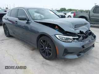 2021 BMW 3 Series 330i with VIN 3MW5R1J09M8C15403, listed as a IAAI auction lot 41892341 with 30,975 mi miles and . Bid and sale history available at carsss.com. Image 1.