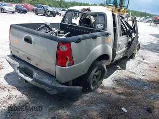 2004 Ford Explorer Sport Trac XLS with VIN 1FMZU67K14UA83504, listed as a IAAI auction lot 39410992 with Not provided miles and . Bid and sale history available at DreamBid. Image 4.