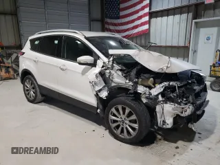 2017 Ford Escape Titanium with VIN 1FMCU0J91HUB65876, listed as a Copart auction lot 42052035 with 115,851 mi miles and Salvage Title. Bid and sale history available at carsss.com. Image 4.