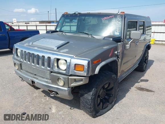 2004 Hummer H2 z VIN 5GRGN23U34H105809, wystawiony jako IAAI lot #42456055 z przebiegiem Nie podano mil oraz . Historia ofert i sprzedaży dostępna na DreamBid. Obrazek 18.