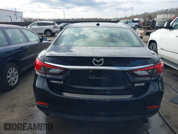 2016 Mazda 6 i Grand Touring with VIN JM1GJ1W54G1454115, listed as a IAAI auction lot 41203298 with 104,632 mi miles and . Bid and sale history available at DreamBid. Image 17.