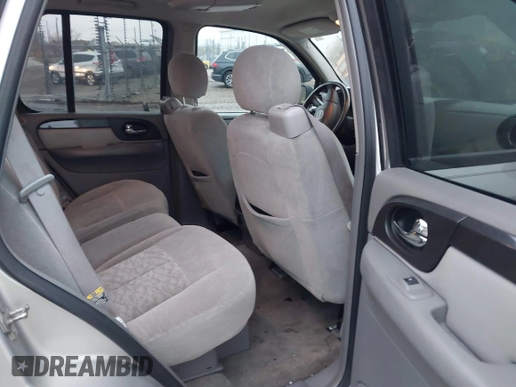 2006 GMC Envoy SLT with VIN 1GKDT13SX62342147, listed as a IAAI auction lot 40873738 with 159,092 mi miles. Bid and sale history available at carsss.com. Image 8.