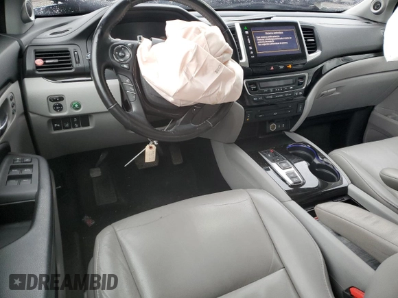 2016 Honda Pilot Touring with VIN 5FNYF6H91GB022219, listed as a Copart auction lot 52796985 with 142,014 mi miles and Salvage Title. Bid and sale history available at carsss.com. Image 8.