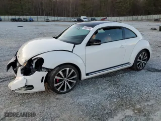 2012 Volkswagen Beetle 2.0T Turbo w/Sun/Sound with VIN 3VWV67AT4CM645268, listed as a Copart auction lot 88001065 with 0 mi miles and Salvage Title. Bid and sale history available at carsss.com. Image 1.