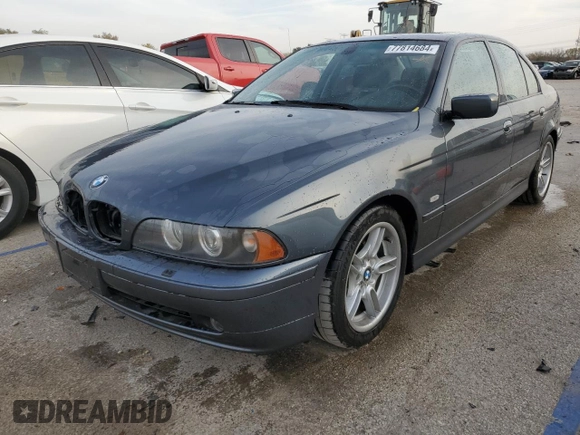 2001 BMW 5 Series 540iA with VIN WBADN634X1GM73365, listed as a Copart auction lot 77814684 with 142,374 mi miles and Salvage Title. Bid and sale history available at carsss.com. Image 1.