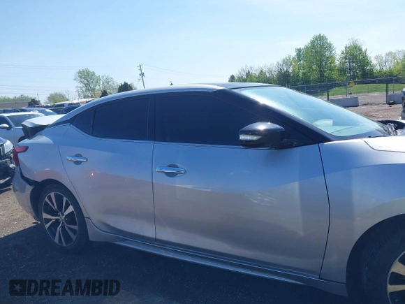 2018 Nissan Maxima SR with VIN 1N4AA6AP3JC374804, listed as a IAAI auction lot 42145406 with 136,757 mi miles. Bid and sale history available at carsss.com. Image 14.