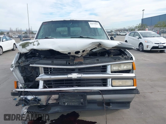 1997 Chevrolet Suburban with VIN 3GNFK16R9VG187426, listed as a IAAI auction lot 41678063 with 131,387 mi miles. Bid and sale history available at carsss.com. Image 12.