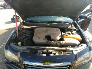2014 Chrysler 300 with VIN 2C3CCAGG7EH240120, listed as a IAAI auction lot 40629490 with 142,041 mi miles. Bid and sale history available at carsss.com. Image 10.