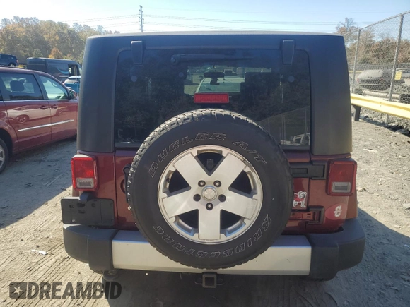 2010 Jeep Wrangler Sahara с VIN 1J4GA5D16AL225139, выставлен на аукционе Copart как лот 77114204 с пробегом Не указан миль и Списание • Salvage title. История ставок и продаж доступна на DreamBid. Изображение 6.