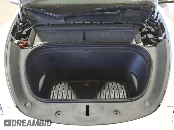 2022 Tesla Model Y Performance with VIN 7SAYGDEF7NF520825, listed as a Copart auction lot 57400245 with 55,437 mi miles and Salvage title. Bid and sale history available at DreamBid. Image 12.