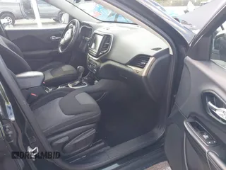 2014 Jeep Cherokee Altitude with VIN 1C4PJMCB5EW146365, listed as a IAAI auction lot 42021350 with 120,652 mi miles and . Bid and sale history available at carsss.com. Image 5.