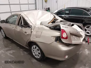 2010 Toyota Corolla with VIN 1NXBU4EE0AZ271333, listed as a IAAI auction lot 42308815 with 99,649 mi miles and . Bid and sale history available at DreamBid. Image 6.