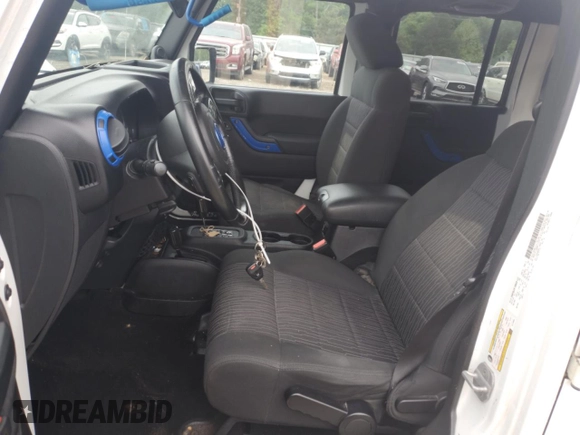 2012 Jeep Wrangler Unlimited Sahara with VIN 1C4HJWEG8CL126053, listed as a Copart auction lot 54363285 with 88,014 mi miles and Salvage title. Bid and sale history available at DreamBid. Image 7.