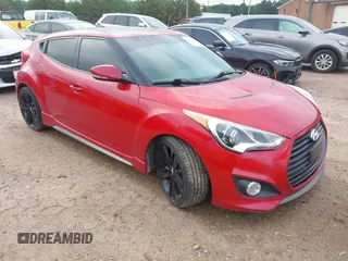 2013 Hyundai Veloster Turbo with VIN KMHTC6AE1DU110874, listed as a IAAI auction lot 42469891 with 167,035 mi miles and . Bid and sale history available at DreamBid. Image 1.