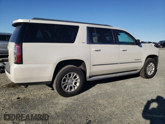 2015 GMC Yukon XL SLT with VIN 1GKS1HKC2FR130964, listed as a Copart auction lot 87796695 with 173,020 mi miles and Salvage Title. Bid and sale history available at carsss.com. Image 3.