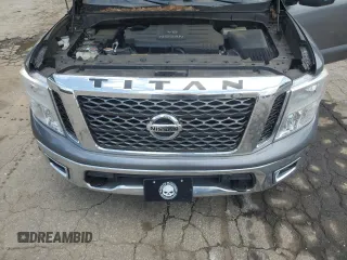 2017 Nissan Titan Platinum Reserve z VIN 1N6AA1E56HN571502, wystawiony jako Copart lot #56751155 z przebiegiem 105 017 mil mil oraz Szkoda całkowita • Salvage title. Historia ofert i sprzedaży dostępna na DreamBid. Obrazek 11.