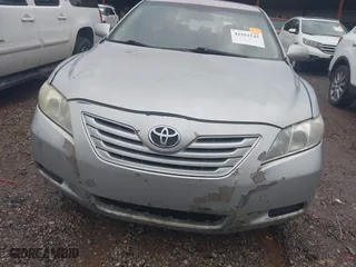 2007 Toyota Camry CE with VIN 4T1BE46K77U513111, listed as a IAAI auction lot 41561545 with 310,776 mi miles. Bid and sale history available at carsss.com. Image 6.